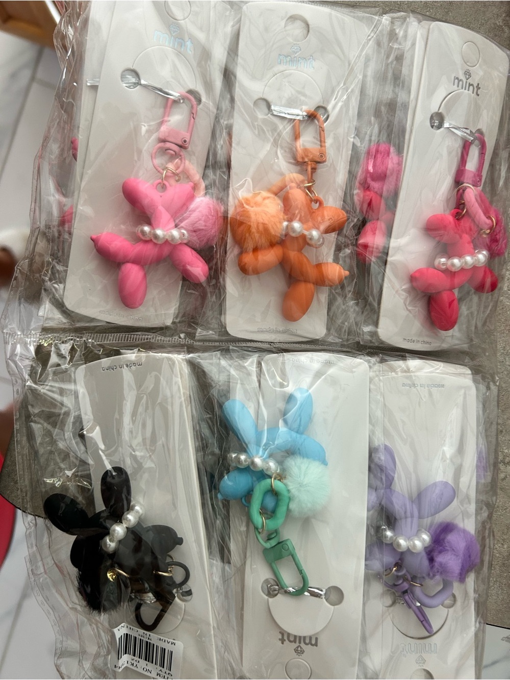 4/$100 Balloon dog pack of 12 fun keychains